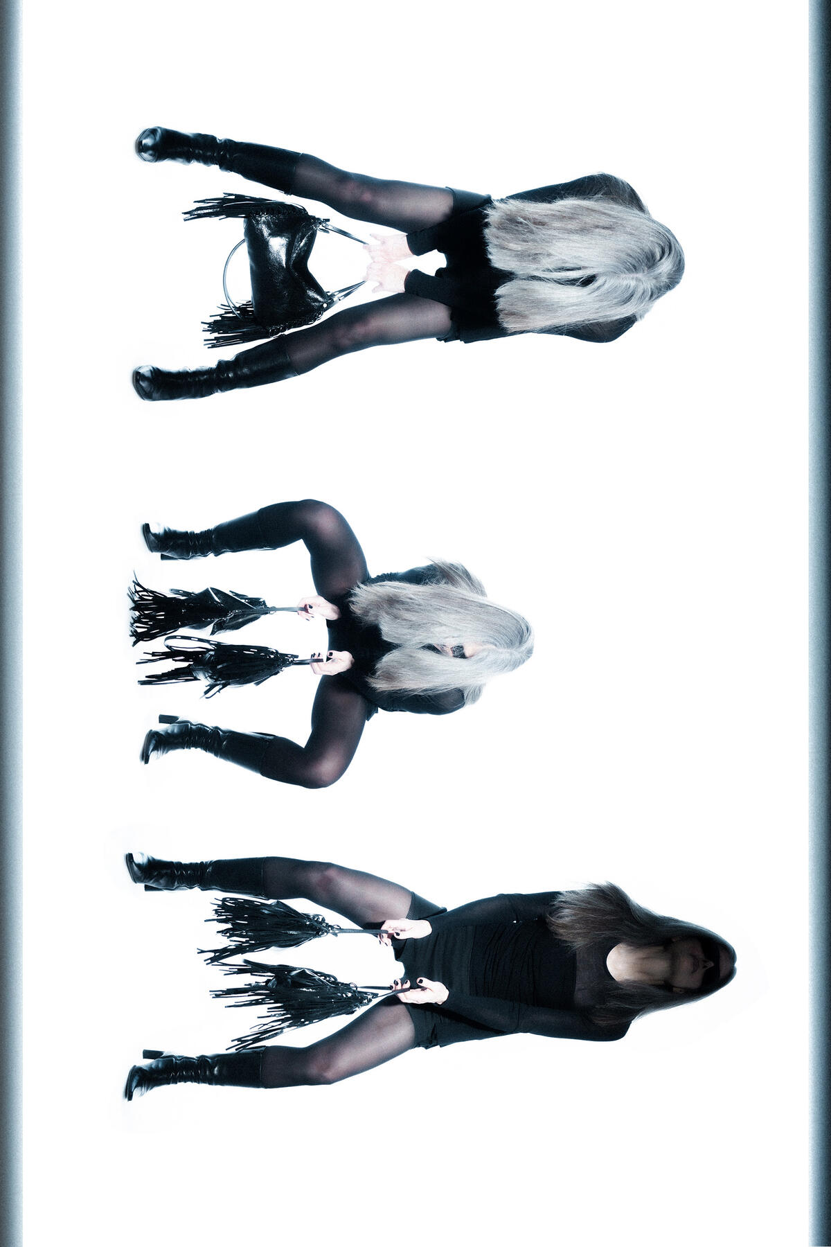 Three images of a person in black clothing, sitting and holding an INA KENT fringed bag, arranged vertically against a white background.
