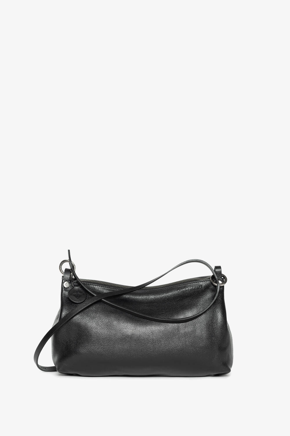  Product image of the INA KENT ORNAMENT ed.2 bag made of smooth leather in black. The bag impresses with its minimalist design and versatile carrying options with a simple, elegant leather strap.