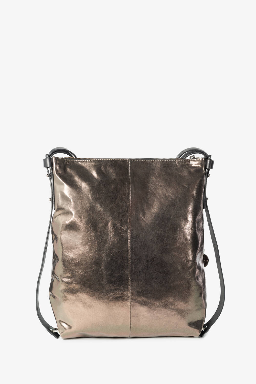 Metallic silver tote bag by INA KENT with a glossy finish, black adjustable shoulder strap, and minimalistic design photographed against a white background.