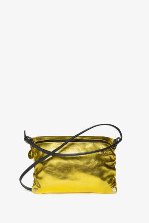 A metallic yellow INA KENT clutch with a black strap is displayed on a white background.