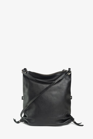 The INA KENT black leather crossbody bag features adjustable straps and a top zipper closure, elegantly displayed against a plain white background.