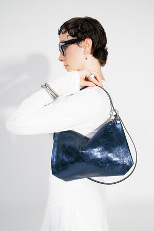 ORNAMENT ed.2 crackled deep navy shoulder bag - made of shiny, blue metallic leather, worn short on the shoulder