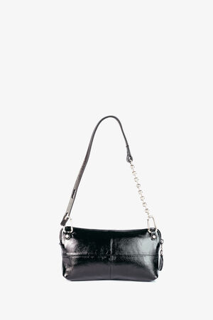 Eine kleine schwarze Lederhandtasche von INA KENT mit einem kurzen Schulterriemen und silbernen Beschlägen, fotografiert vor einem schlichten weißen Hintergrund.