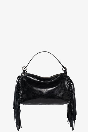 An INA KENT black leather handbag with a single handle, zipper closure, and long fringe detailing on both sides, photographed against a plain white background.