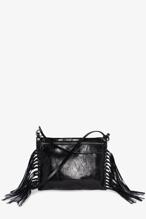 Black leather crossbody bag by INA KENT with a zip closure and long fringe detailing on both sides, displayed against a plain white background.