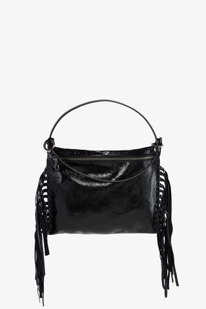 A black patent leather INA KENT handbag with a single shoulder strap, front zipper, and fringe detailing on both sides, set against a plain white background.