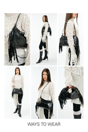A woman demonstrates five different ways to wear the INA KENT black fringed handbag, showcasing various positions including crossbody, shoulder, and hand-held styles.