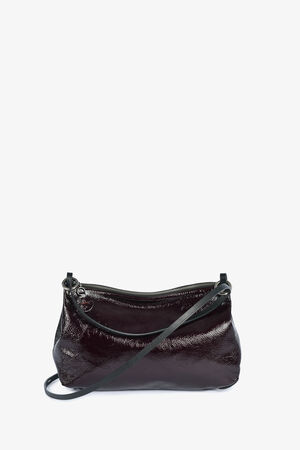 A small, glossy dark brown INA KENT leather crossbody bag with a zipper closure and a thin shoulder strap, set against a plain white background.