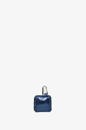 A small, metallic blue leather pouch by INA KENT with a silver clasp attached at the top, set against a plain white background.