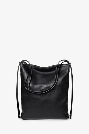 A large black leather tote bag by INA KENT, featuring double shoulder straps and a zippered top, photographed against a plain white background.