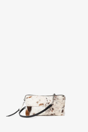 Small rectangular INA KENT clutch with a cowhide pattern, zipper closure, and a black leather wrist strap, displayed against a plain white background.