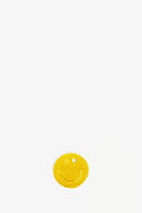 Gelber Lederanhänger in Smileyform