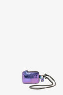 A small, metallic purple zippered pouch by INA KENT with a matching keychain attachment and a black lanyard, set against a plain white background.