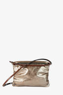 A metallic gold INA KENT crossbody bag with a brown adjustable strap, zip closure, and subtle textured finish, displayed against a white background.