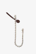 A silver beaded chain with two lobster clasps, a brown leather tag, and a round INA KENT metal charm, displayed on a white background.