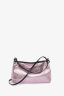 A metallic pink INA KENT shoulder bag with a black strap, zipper closure, and a small round charm attached to one side, shown against a plain white background.