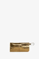 Metallic gold leather pouch by INA KENT with a flap closure and silver carabiner clip attached to one end, set against a plain white background.