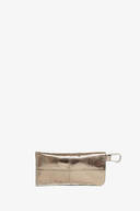 Metallic silver rectangular pouch by INA KENT with a zipper and metal clip attached to one end, displayed on a plain white background.