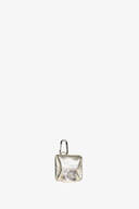 Small metallic silver INA KENT pouch with a flap closure and a carabiner clip attached at the top, displayed on a plain white background.