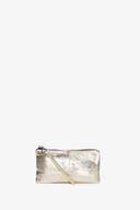 A small metallic gold INA KENT zippered clutch with a wrist strap, displayed against a plain white background.