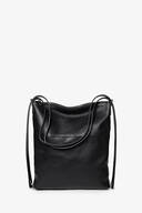 Black leather tote bag by INA KENT with two slim shoulder straps, a zippered top closure, and minimal design against a plain white background.